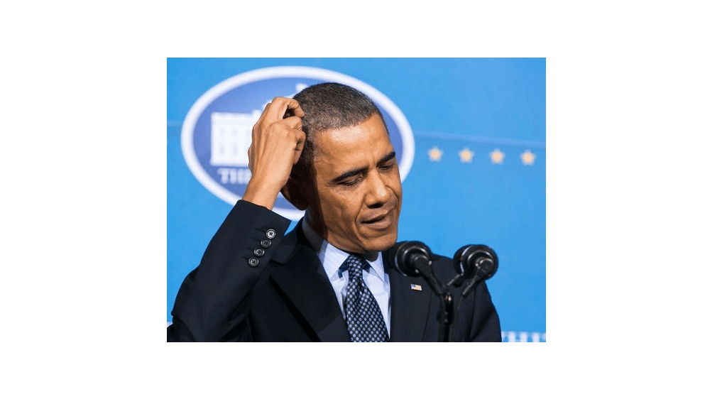 Barack Obama scratching his head