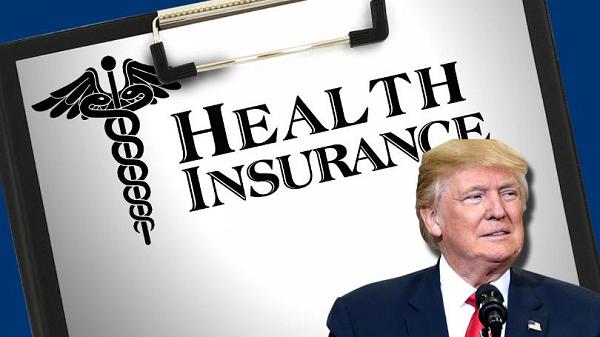 Donald Trump with document titled Health Insurance in background